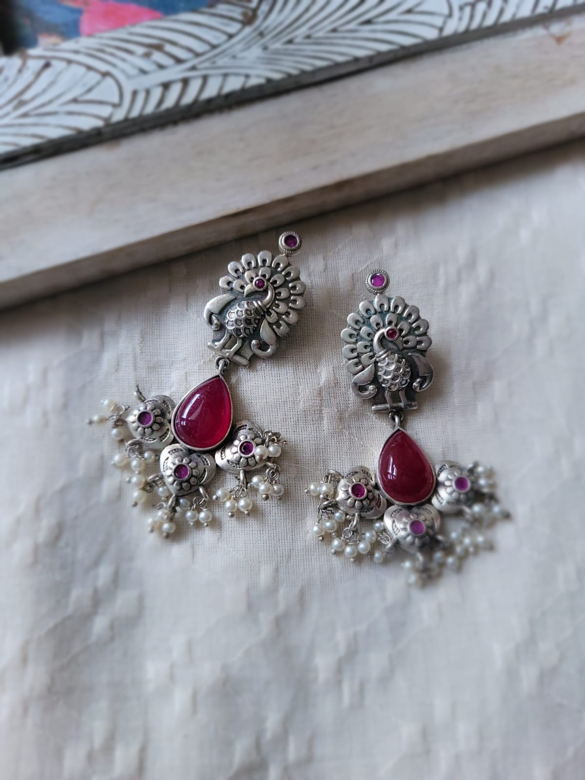 The Maroon Dazzling Peacock